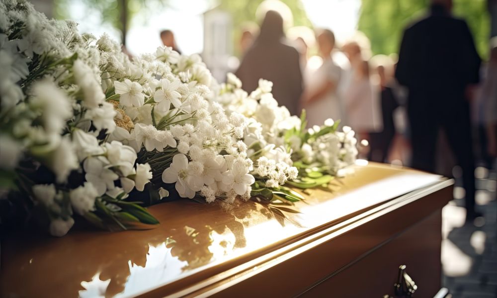 A reverent funeral scene the coffin is decorated with flowers Symbolic farewell among church services and cemetery funerals