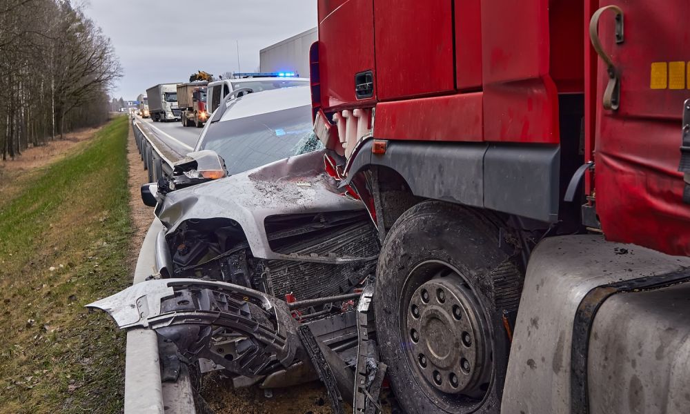 Car after a collision with a heavy truck