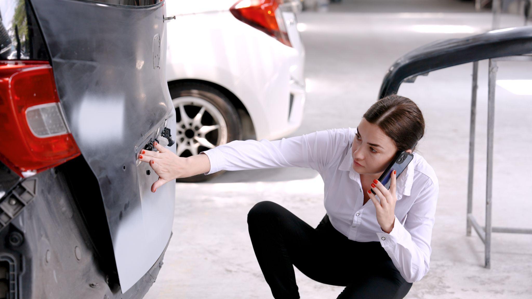 inspecting auto accident damage